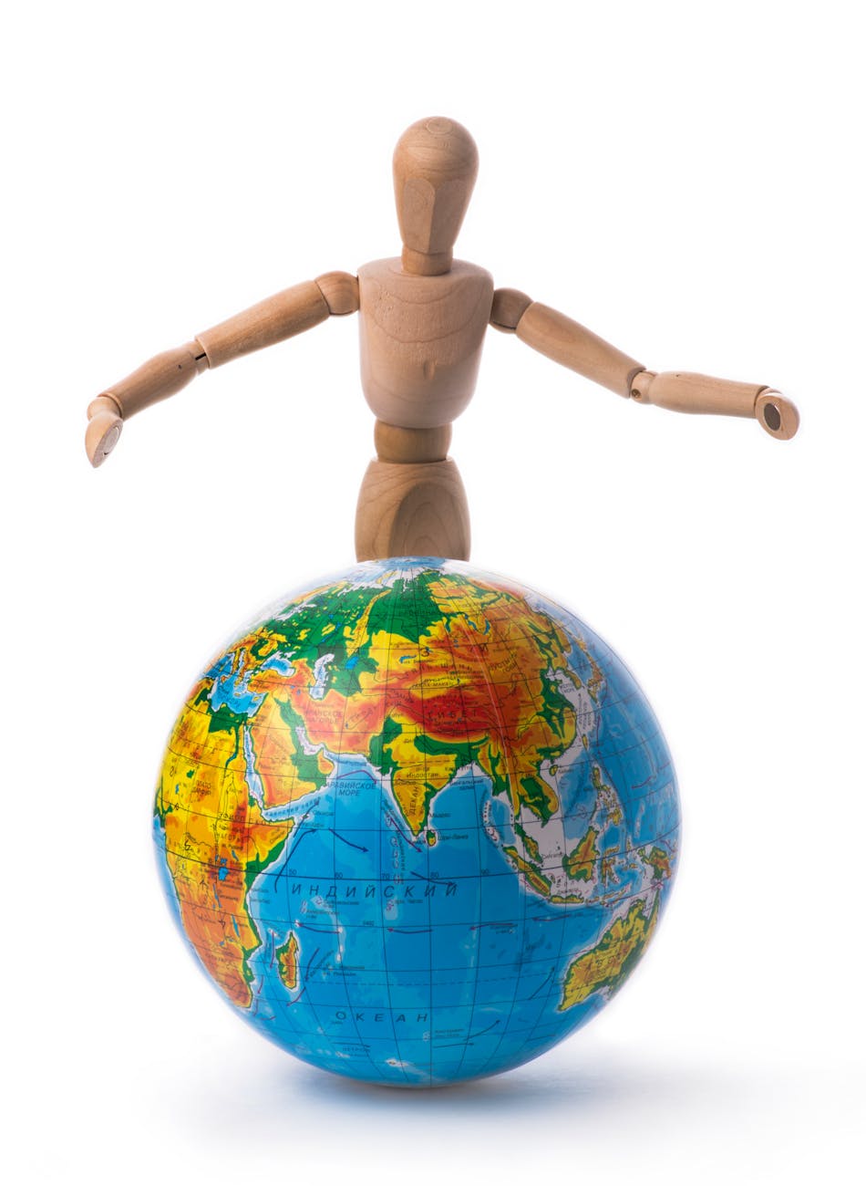 US and South Africa flags waving, symbolizing strained relations after US personnel detention.